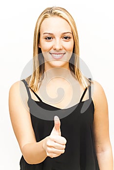 Portrait of Beautiful Young Woman with the thumb upwards over