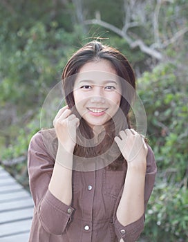 Portrait of beautiful young woman toothy smiling with happy face and joy emotion