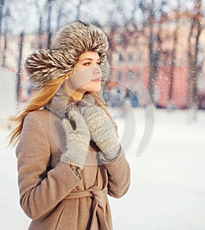 Portrait beautiful young woman wearing a coat and hat