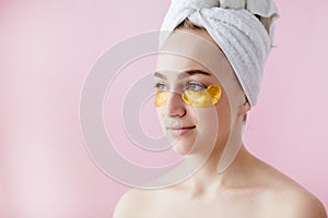 Portrait of Beauty Woman with Eye Patches on pink background. Woman Beauty Face with Mask under Eyes. Beautiful Female with