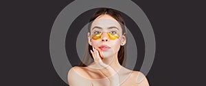 Portrait of beauty woman with eye patches showing an effect of perfect skin. Eyes mask cosmetic patches woman face