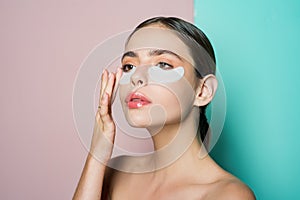 Portrait of beauty woman with eye patches. Woman beauty face with mask under eyes. Beautiful female with natural makeup