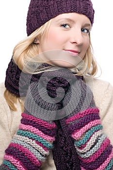 Portrait of a beauty young woman in a warm hat and