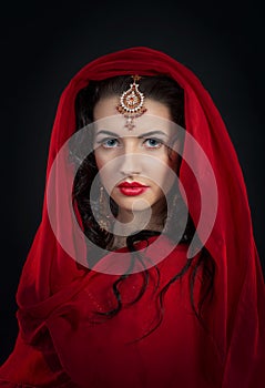 Portrait of belly dancer in red costume