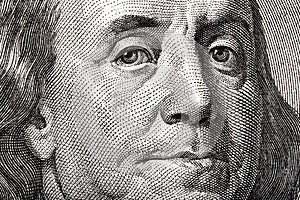 Portrait of Ben Franklin on the US 100 dollar bill in macro for your unique project.