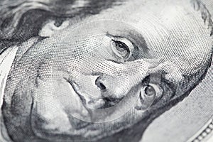 Portrait of Benjamin Franklin on 100 dollar bill, money concept photo