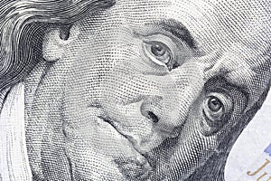 portrait of Benjamin Franklin on one hundred dollars banknote