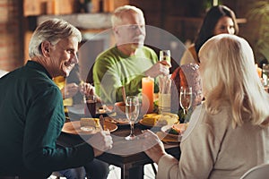 Portrait of big family thanks giving feast stuffed turkey served dinner sit table chatting meeting house living room