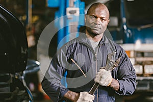 Portrait Black African mechanic garage worker check auto service team staff smart standing confident