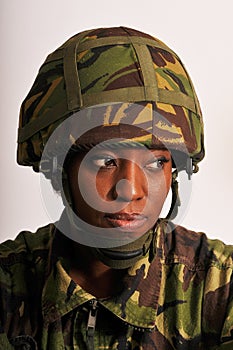 Portrait of black female British Army soldier.