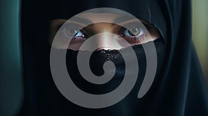 Portrait of black hijab girl with niqab covering her face, piercing gaze and expressive eyes