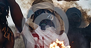 Portrait of black man in gas mask