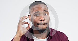 Portrait, black man and mouth zip in studio for secret, gossip or privacy on white background. Confidential, news and