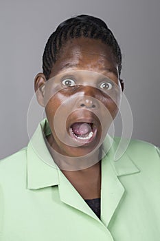 Portrait of a black middle aged woman making facial expressons