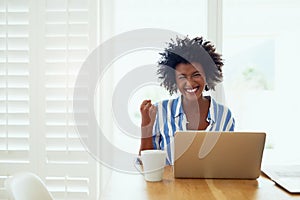 Portrait, black woman and laptop in home with celebration for career success, entrepreneur and fist. African female