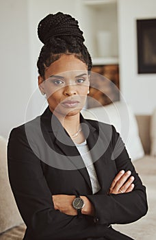 Portrait, black woman and leader arms crossed, manager and serious look in office. African American female, ceo or