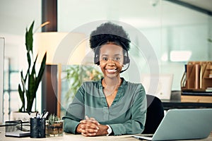 Portrait, black woman and smile in call center for telemarketing, customer service or business in office. Contact us