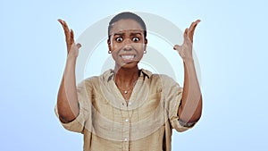 Portrait, black woman and surprise with announcement, shocked and facial expression on a blue background. Face, African