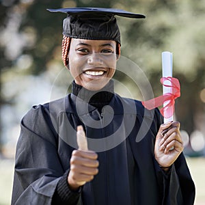 Portrait, black woman and thumbs up for graduation, education and success with degree. African American female, hand or