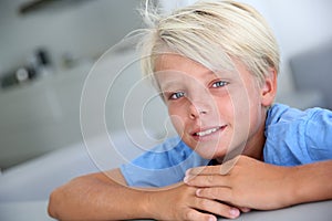 Portrait of blond boy with blue eyes