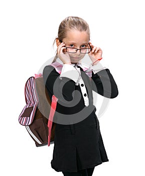 Portrait of blond girl in glassesl with school bag photo