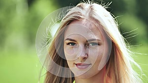 Portrait of a blonde girl of Slavic appearance. Close-up face.