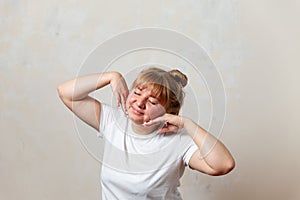 Portrait of  blonde girl in  white T-shirt