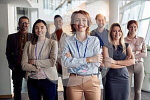 Portrait of bold and outgoing group of successful business people, looking at camera