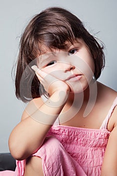 Portrait of bored little Asian girl