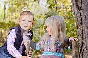 Portrait of Boy and Girl in Forest