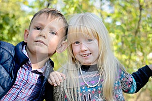 Portrait of Boy and Girl in Forest