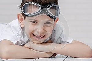 Portrait of a boy with glasses pilot