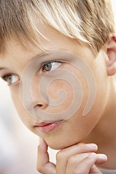 Portrait Of Boy Looking Pensive