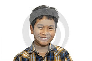 Portrait of a boy with messy hair looking at camera against white background