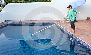 Portrait of a boy near the swimming pool