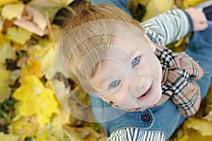 Portrait of a boy with a scarf around his neck