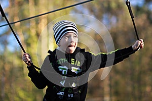 Portrait of a boy surmounting obstacles photo