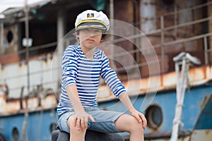 Portrait of a boy in a vest Telnyashka