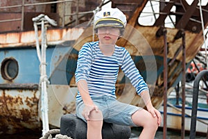 Portrait of a boy in a vest Telnyashka.