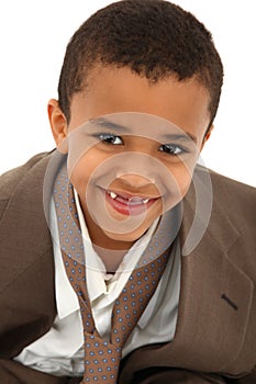 Portrait Of Boy Wearing Father's Suit And Tie