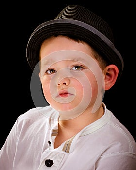 Portrait of boy wearing fedora