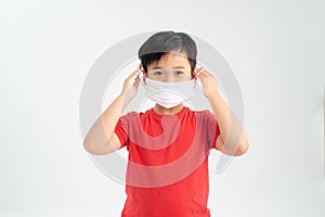 Portrait of a boy wearing a medicine healthcare mask