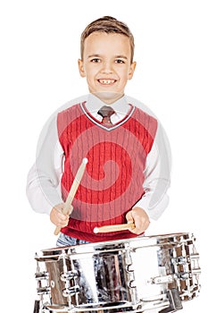 Portrait Boy young boy drumming on white background.