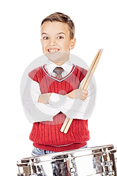 Portrait Boy young boy drumming on white background.
