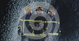 Portrait of the Brave Male and Female Firefighter Group Walking to the Camera as Courageous Heroes and Fireme0n Rescue