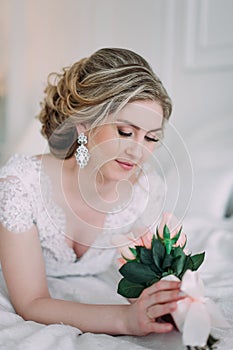 Portrait of bride in flower decor, studio photo. Beautiful Bride portrait wedding makeup and hairstyle, fashion bride model jewelr