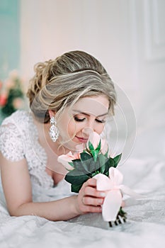 Portrait of bride in flower decor, studio photo. Beautiful Bride portrait wedding makeup and hairstyle, fashion bride model jewelr