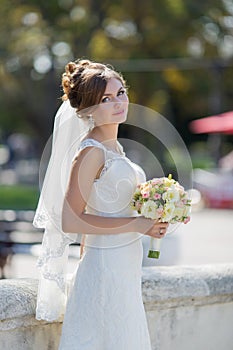 Portrait of bride in park