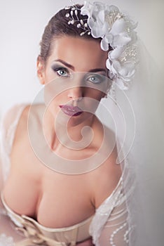 Portrait of the bride with white flowers in her hair