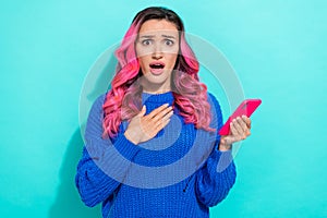 Portrait of bright upset woman wear knit pullover instagram facebook twitter whatsapp telegram isolated on vibrant teal